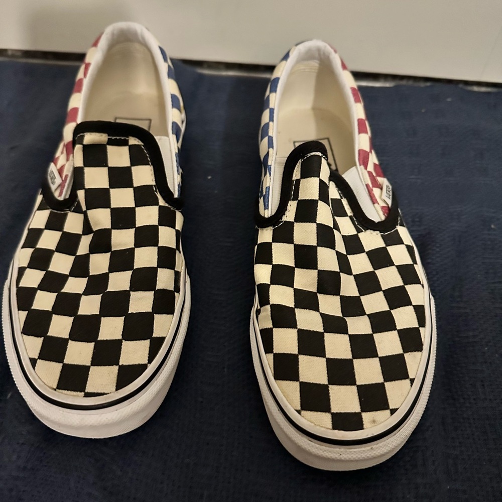 Vans Checkerboard Slip-On Sneakers - Black, White, Red, Blue, and Yellow.